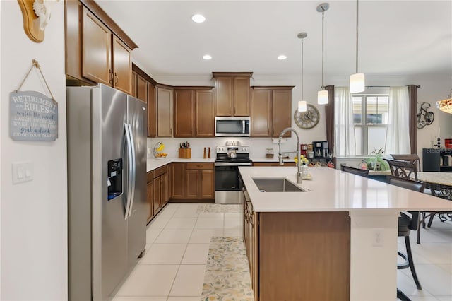 kitchen with appliances with stainless steel finishes, a sink, light tile patterned floors, light countertops, and recessed lighting