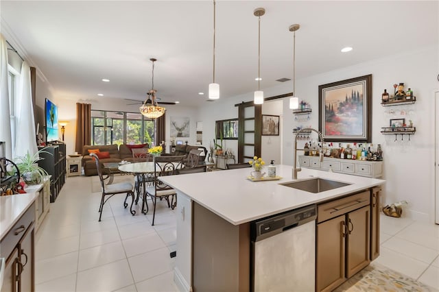 kitchen featuring dishwasher, open floor plan, light countertops, pendant lighting, and recessed lighting