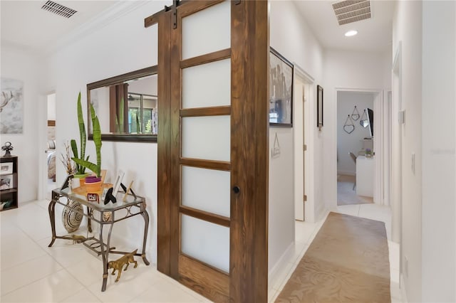 hall featuring tile patterned floors, recessed lighting, and ornamental molding