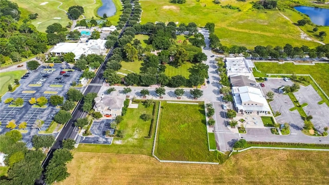 bird's eye view of a large body of water and a golf course