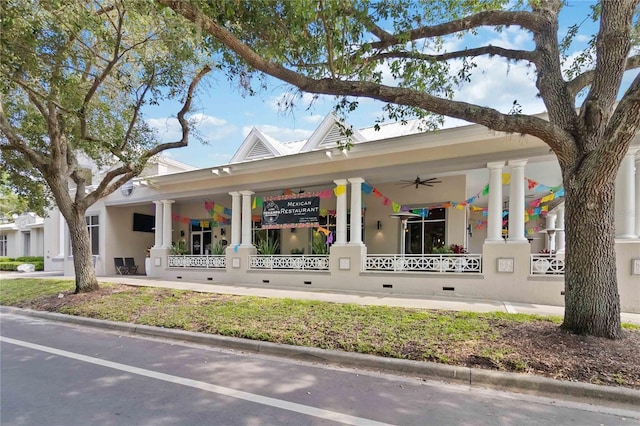 3378 Sagebrush St, Harmony, FL 34773 - exterior space featuring ceiling fan, stucco siding, and a porch