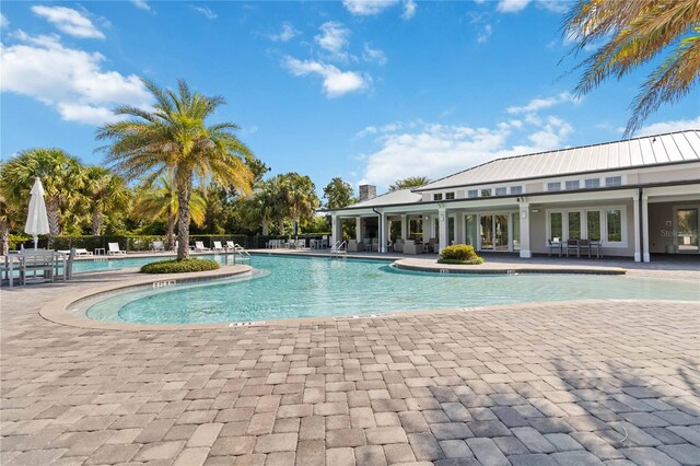 3378 Sagebrush St, Harmony, FL 34773 - community pool featuring a patio and fence