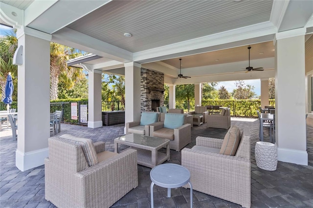 3378 Sagebrush St, Harmony, FL 34773 - view of patio / terrace featuring an outdoor living space with a fireplace and ceiling fan