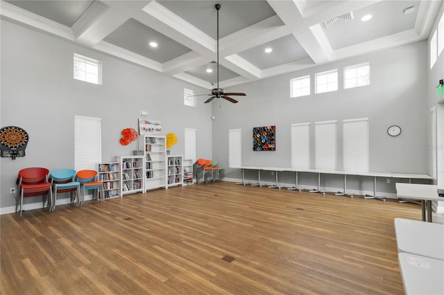 3378 Sagebrush St, Harmony, FL 34773 - game room with a high ceiling, coffered ceiling, wood finished floors, baseboards, and beam ceiling