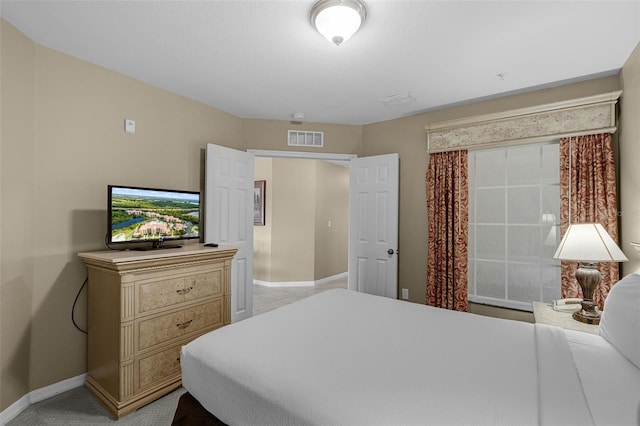 bedroom with baseboards