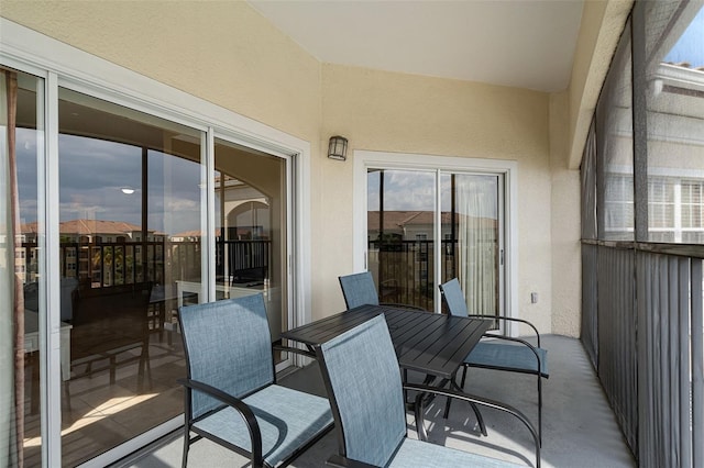 balcony featuring outdoor dining space