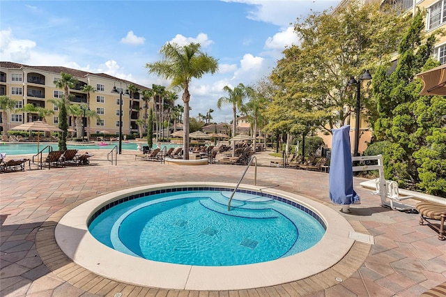 community pool featuring a patio