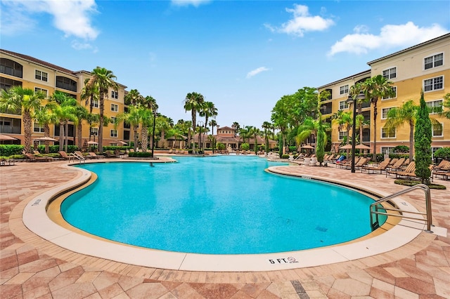 community pool with a patio