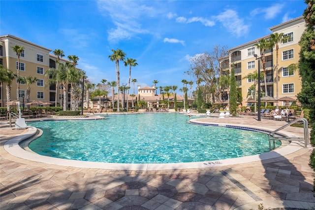 pool with a patio area
