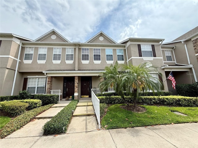 2287 Park Maitland Ct, Maitland, FL 32751 - view of property with covered porch and stucco siding