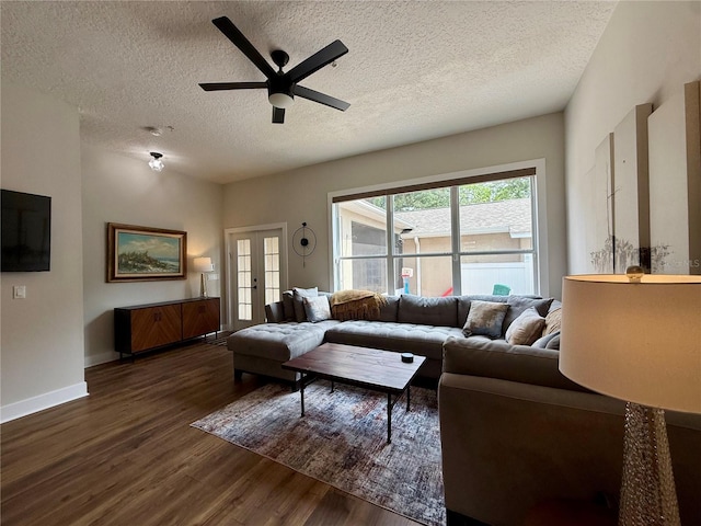 2287 Park Maitland Ct, Maitland, FL 32751 - living room with french doors, wood finished floors, a textured ceiling, ceiling fan, and baseboards