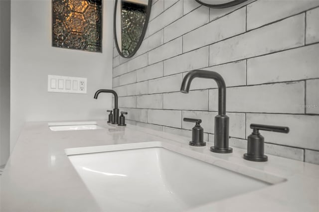 2287 Park Maitland Ct, Maitland, FL 32751 - interior details with tasteful backsplash and a sink