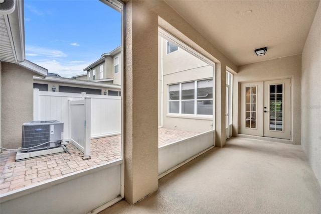 2287 Park Maitland Ct, Maitland, FL 32751 - view of patio / terrace featuring central AC unit, french doors, and fence