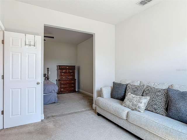 12313 Prairie Plantation Way, Orlando, FL 32824 - living room featuring carpet floors and baseboards