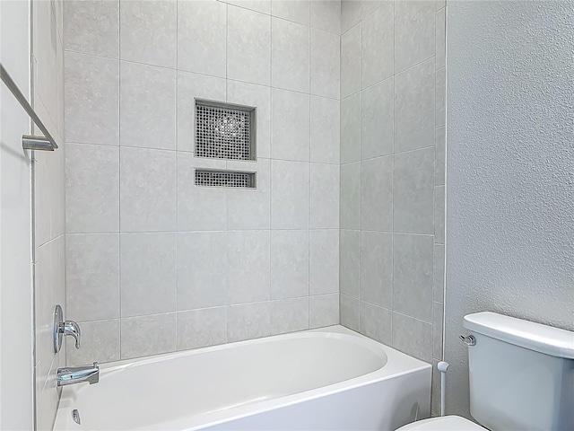 12313 Prairie Plantation Way, Orlando, FL 32824 - full bathroom featuring toilet and tub / shower combination