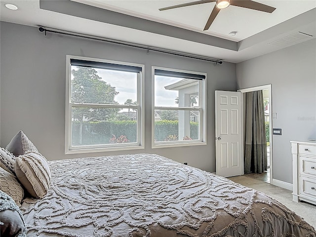 12313 Prairie Plantation Way, Orlando, FL 32824 - bedroom featuring light colored carpet, ceiling fan, and baseboards