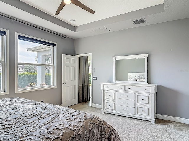 12313 Prairie Plantation Way, Orlando, FL 32824 - bedroom featuring light colored carpet, baseboards, and a ceiling fan