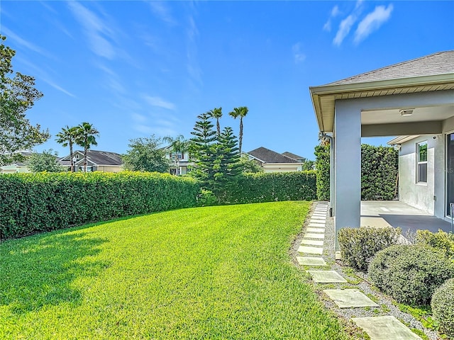12313 Prairie Plantation Way, Orlando, FL 32824 - view of green lawn with a patio