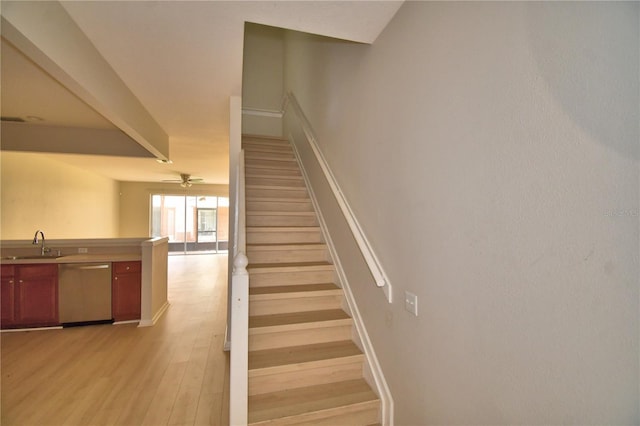 3151 Sinclair St Unit 104, Orlando, FL 32835 - stairway with wood finished floors and ceiling fan
