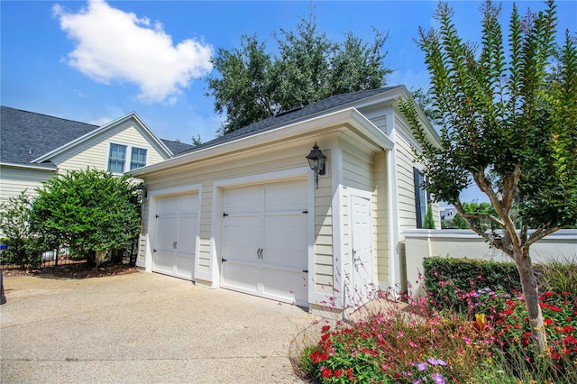 202 Acadia Ter, Kissimmee, FL 34747 - garage with driveway