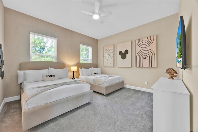 1428 Reunion Blvd, Kissimmee, FL 34747 - carpeted bedroom featuring baseboards and ceiling fan