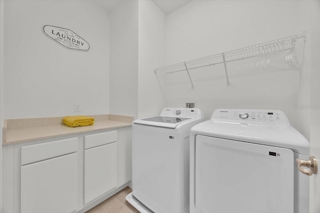 1428 Reunion Blvd, Kissimmee, FL 34747 - laundry area featuring independent washer and dryer and light tile patterned flooring
