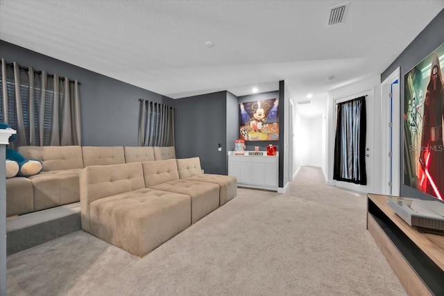 1428 Reunion Blvd, Kissimmee, FL 34747 - living room featuring light carpet and recessed lighting