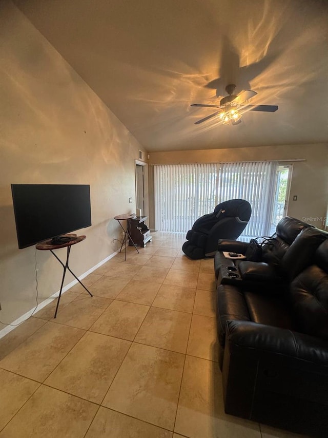 829 Anza Ave, Lehigh Acres, FL 33971 - living room with light tile patterned floors, baseboards, and ceiling fan
