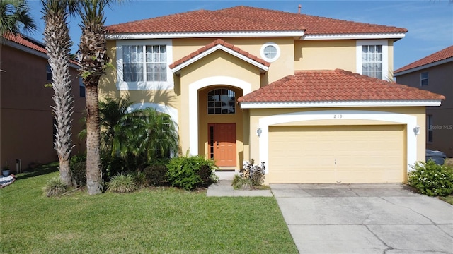 219 Rosso Dr, Davenport, FL 33837 - mediterranean / spanish home featuring stucco siding, an attached garage, driveway, and a front lawn