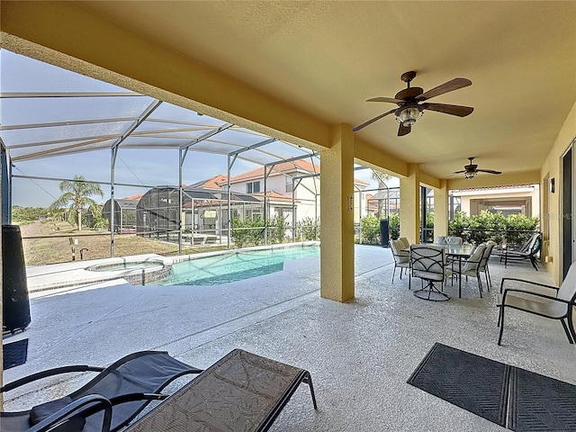 219 Rosso Dr, Davenport, FL 33837 - view of patio / terrace with a ceiling fan, a pool with connected hot tub, a lanai, and outdoor dining space