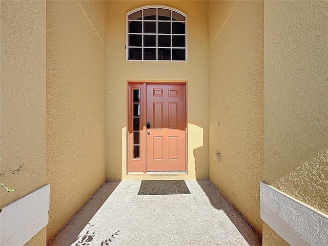 219 Rosso Dr, Davenport, FL 33837 - entrance to property featuring stucco siding