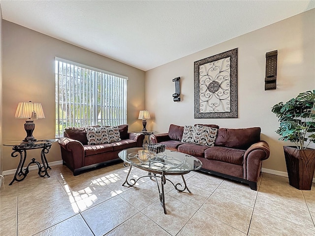 219 Rosso Dr, Davenport, FL 33837 - living room with light tile patterned flooring and baseboards