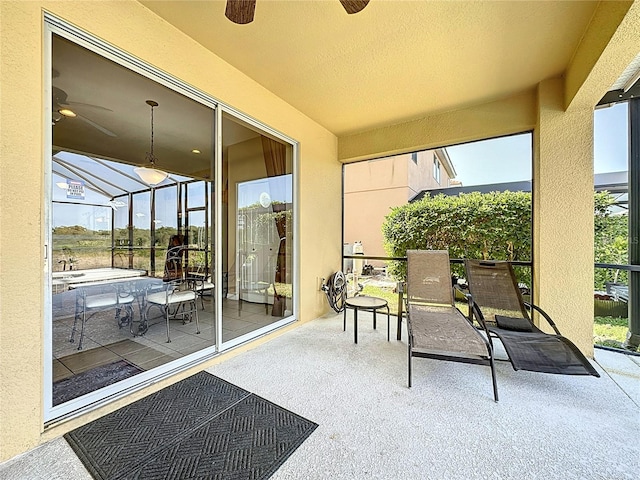 219 Rosso Dr, Davenport, FL 33837 - sunroom / solarium featuring a ceiling fan and healthy amount of natural light