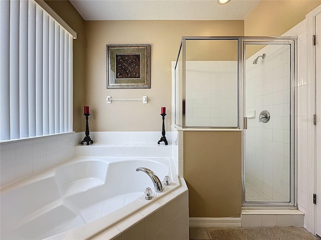 219 Rosso Dr, Davenport, FL 33837 - full bath featuring a stall shower, a bath, and tile patterned flooring