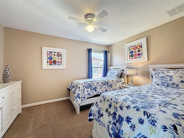 219 Rosso Dr, Davenport, FL 33837 - bedroom with carpet flooring, baseboards, ceiling fan, and a textured ceiling