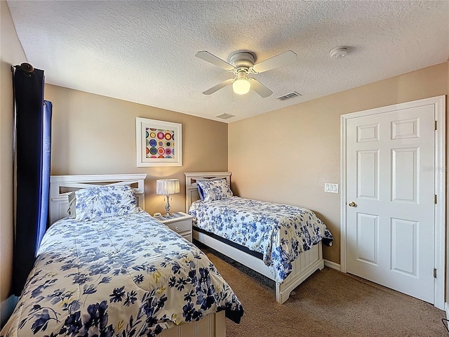 219 Rosso Dr, Davenport, FL 33837 - carpeted bedroom featuring a ceiling fan and a textured ceiling