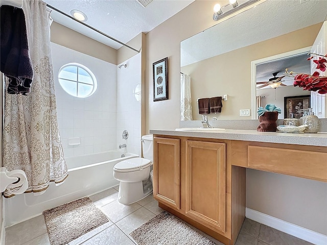 219 Rosso Dr, Davenport, FL 33837 - full bathroom with shower / bath combination with curtain, tile patterned flooring, toilet, vanity, and a textured ceiling
