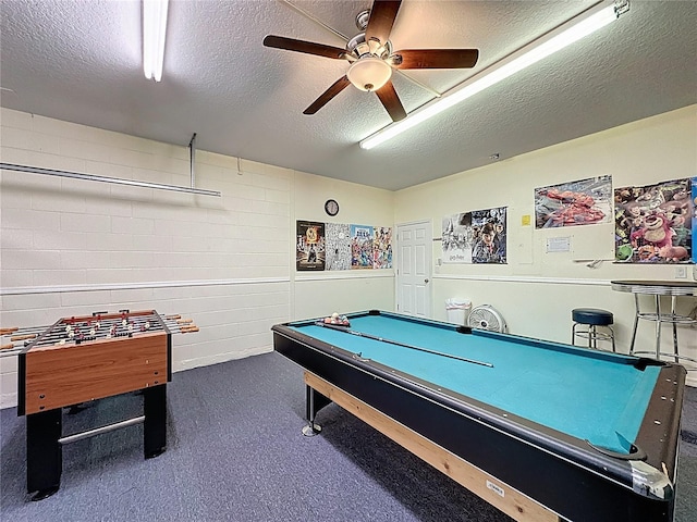 219 Rosso Dr, Davenport, FL 33837 - rec room featuring a textured ceiling, ceiling fan, billiards table, and carpet
