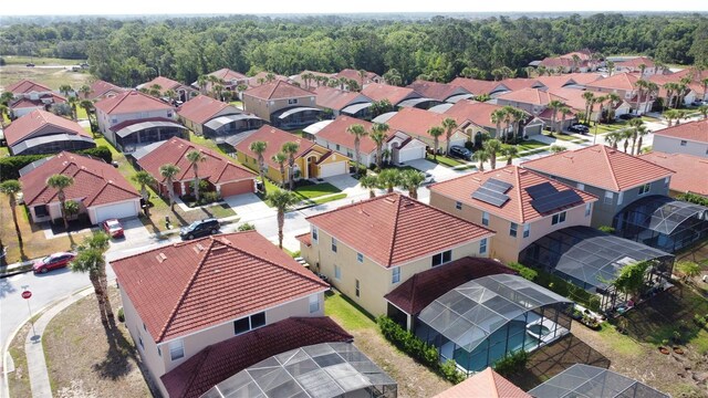 219 Rosso Dr, Davenport, FL 33837 - aerial perspective of suburban area featuring a forest