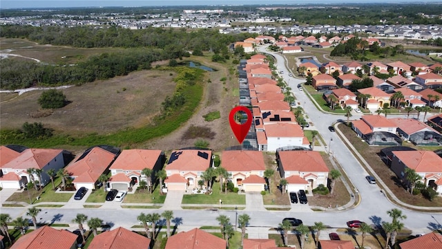 219 Rosso Dr, Davenport, FL 33837 - aerial overview of property's location featuring nearby suburban area