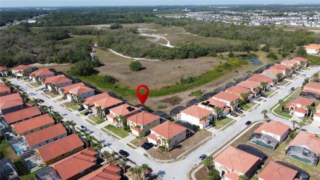 219 Rosso Dr, Davenport, FL 33837 - aerial overview of property's location with nearby suburban area
