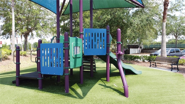 219 Rosso Dr, Davenport, FL 33837 - communal playground with a yard
