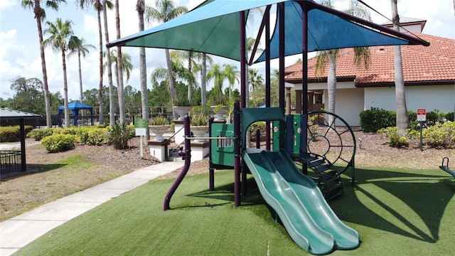 219 Rosso Dr, Davenport, FL 33837 - community play area featuring a lawn