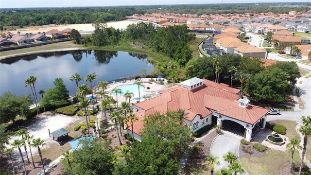 219 Rosso Dr, Davenport, FL 33837 - aerial view of residential area featuring a nearby body of water and a pool