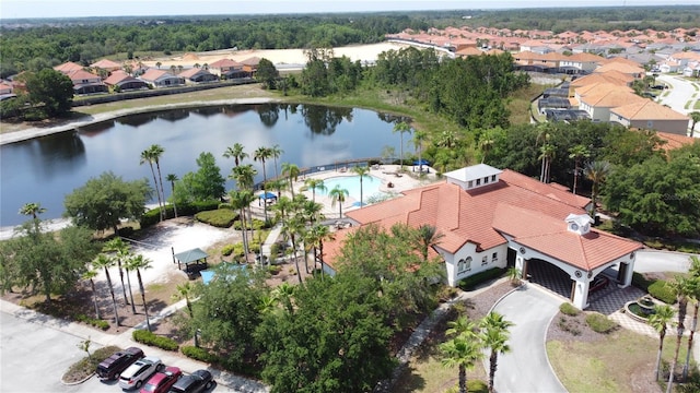219 Rosso Dr, Davenport, FL 33837 - aerial view of residential area with a large body of water and a pool area