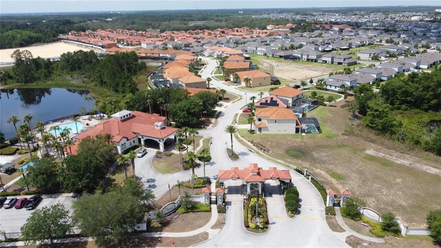 219 Rosso Dr, Davenport, FL 33837 - aerial view of property and surrounding area with nearby suburban area and a nearby body of water