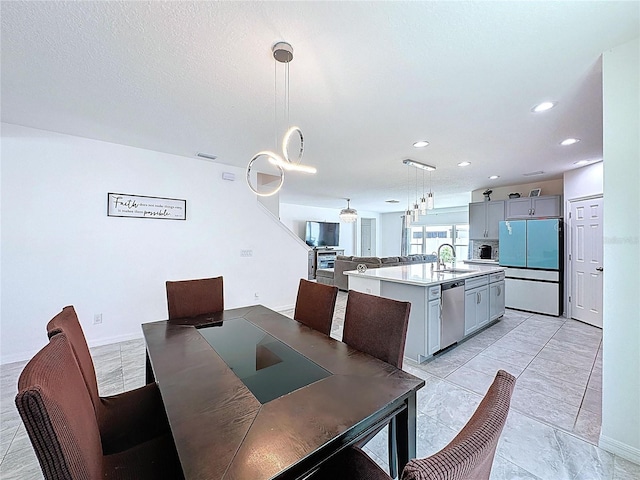 1181 Lone Palm Way, Saint Cloud, FL 34771 - dining room with recessed lighting and light marble finish floors