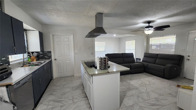 kitchen with wall chimney range hood, light marble finish floors, dishwasher, light countertops, and a sink