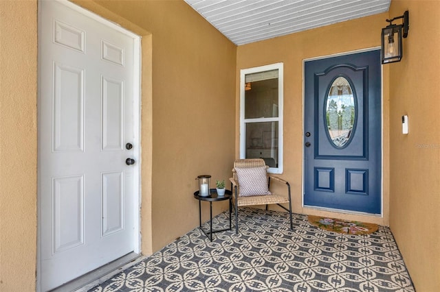 1050 Dees Dr, Oviedo, FL 32765 - property entrance featuring stucco siding and a porch