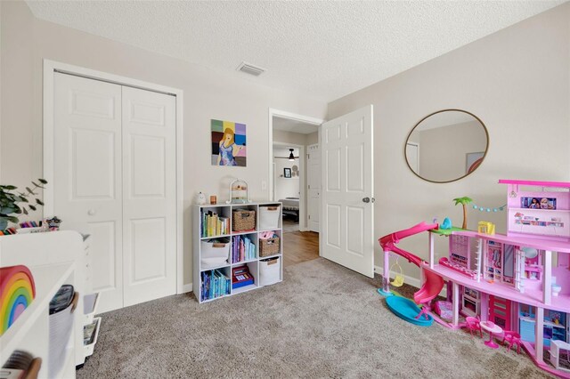 1050 Dees Dr, Oviedo, FL 32765 - game room with carpet floors, a textured ceiling, and baseboards